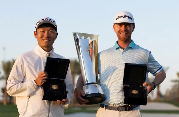 Yosuke Asaji of Japan and Scott Vincent of Zimbabwe during the trophy and LIV Golf League coin presentation at the 2025 PIF Saudi International powered by SoftBank Investment Advisers at Riyadh Golf Club - &copy; Asian Tour.