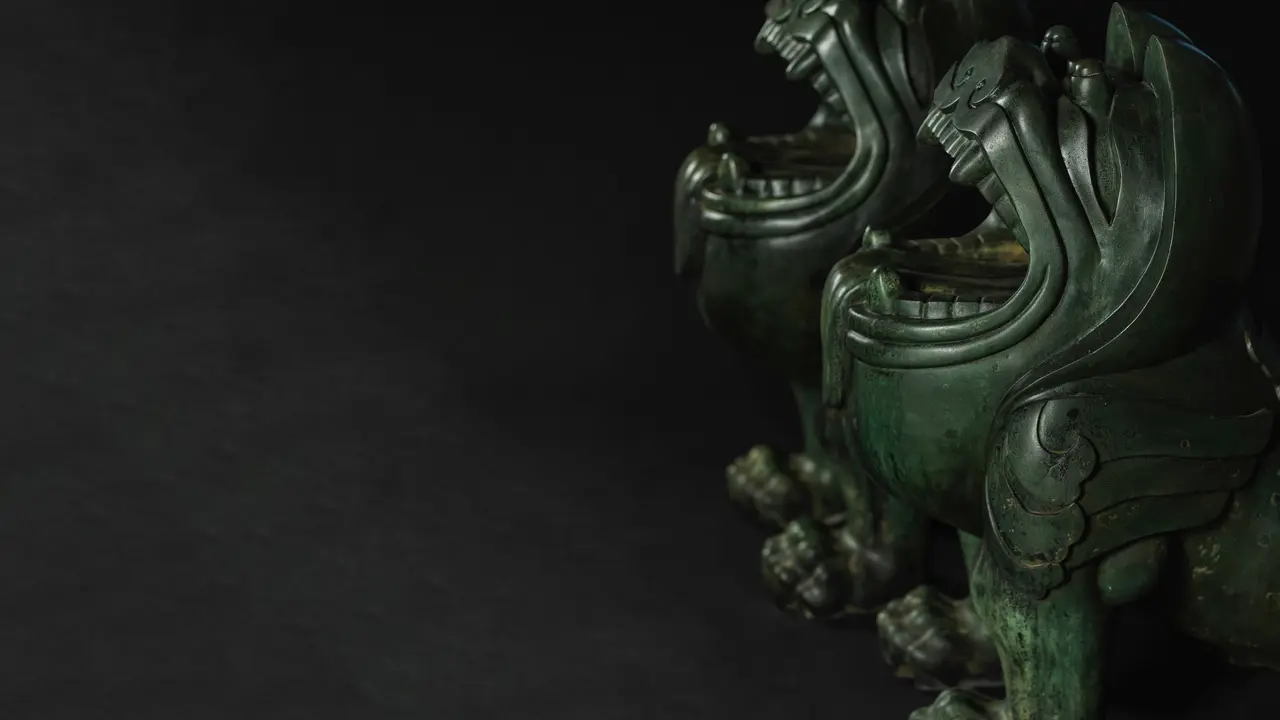 A magnificent and very rare pair of massive bronze-alloy mythical beasts (bixie) from the Qianlong period (1736-1795)